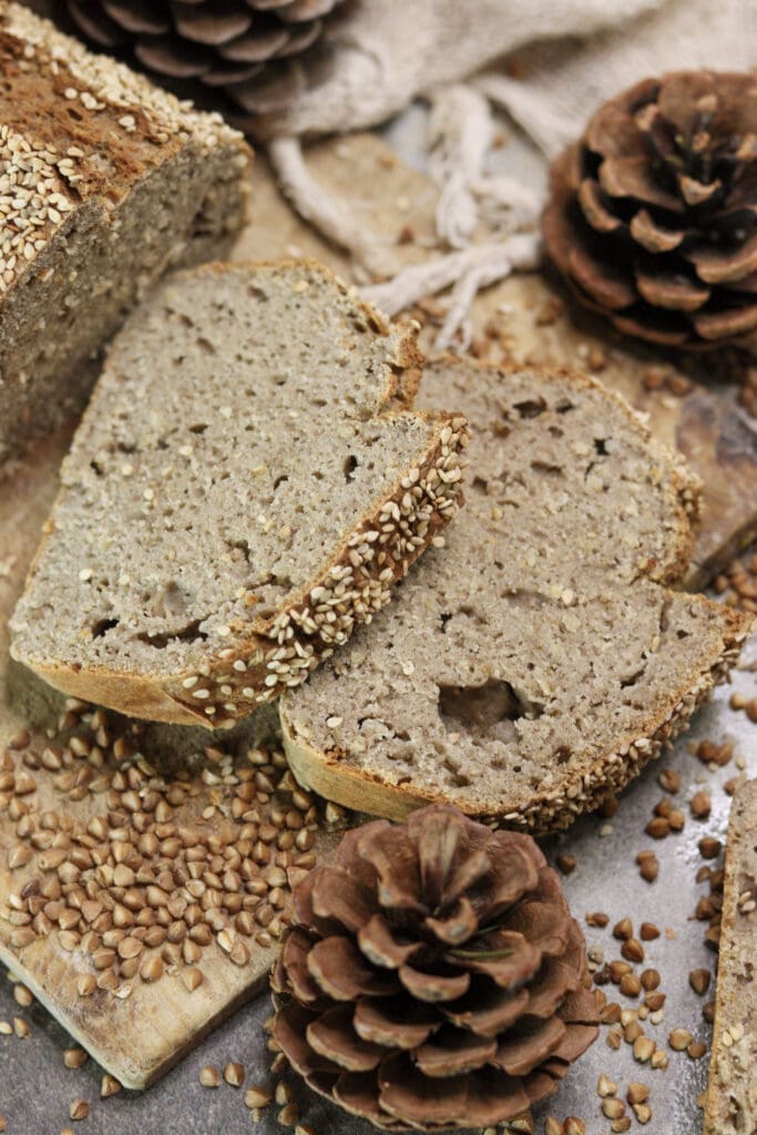 Deliciously looking slices of buckwheat soda bread with yogurt on the table.